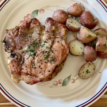 Corn-Stuffed Pork Chops And Herbed Potatoes