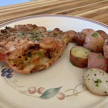 Corn-Stuffed Pork Chops And Herbed Potatoes