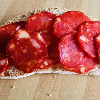 Tuscan bread slice with spicy salame.jpeg