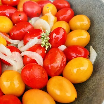 Making cherry tomatoes sauce.jpeg