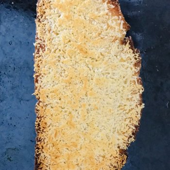 Toasted bread with grated Parmigiano.jpeg