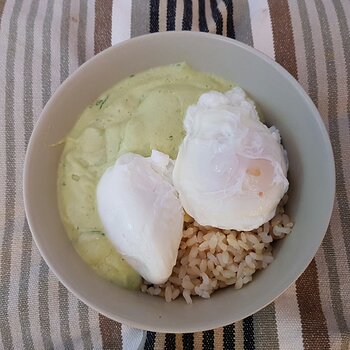 Avocado and coconut soup with poached eggs