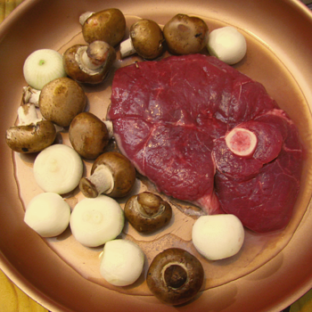 Preparing Lamb Steak with Pearl Onions and Mushrooms