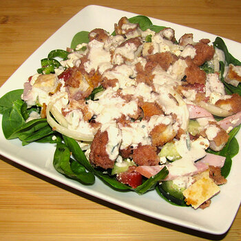 Breaded Chicken Spinach Salad with Creamy Feta Wine Dressing