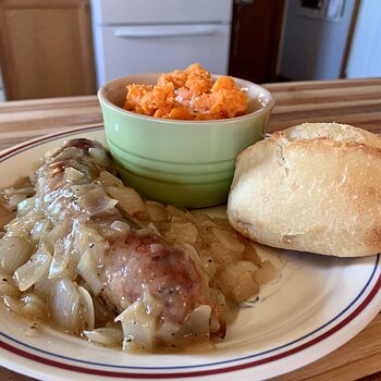 Sausage In Wine W/ Mashed Carrot & Crusty Roll