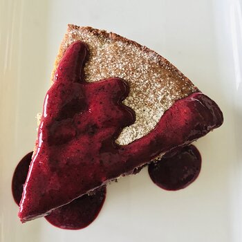 A slice with berries sauce.jpeg