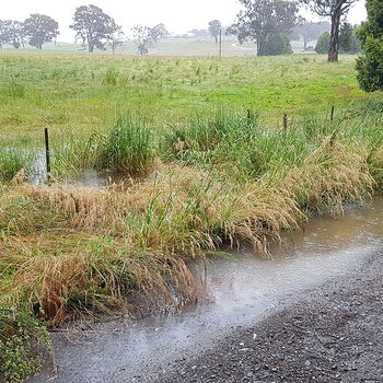 flooding on the track is from the drainage ditch. it has washed the track away previously