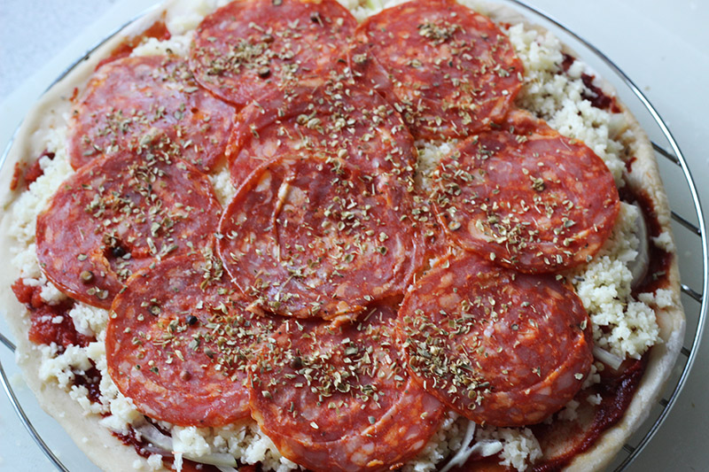 5. Sliced pepperoni and dried oregano.