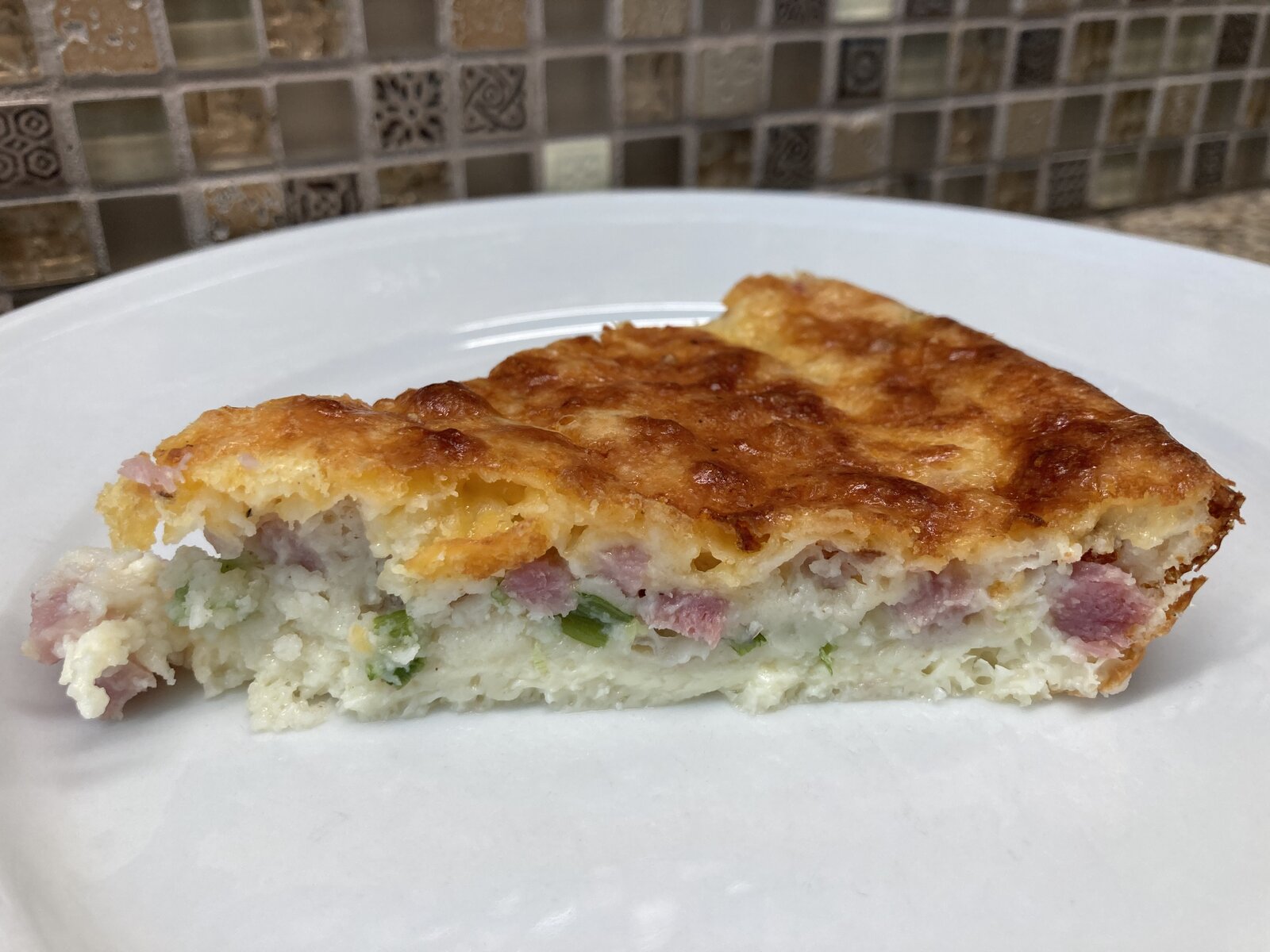 A slice of Impossible Ham & Cheese Pie
