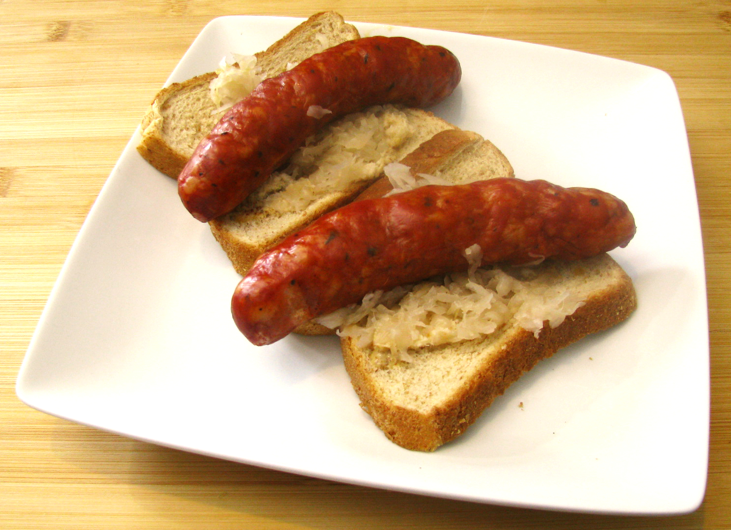 Andouillle Sandwich with Horse Radish and Sauer Kraut