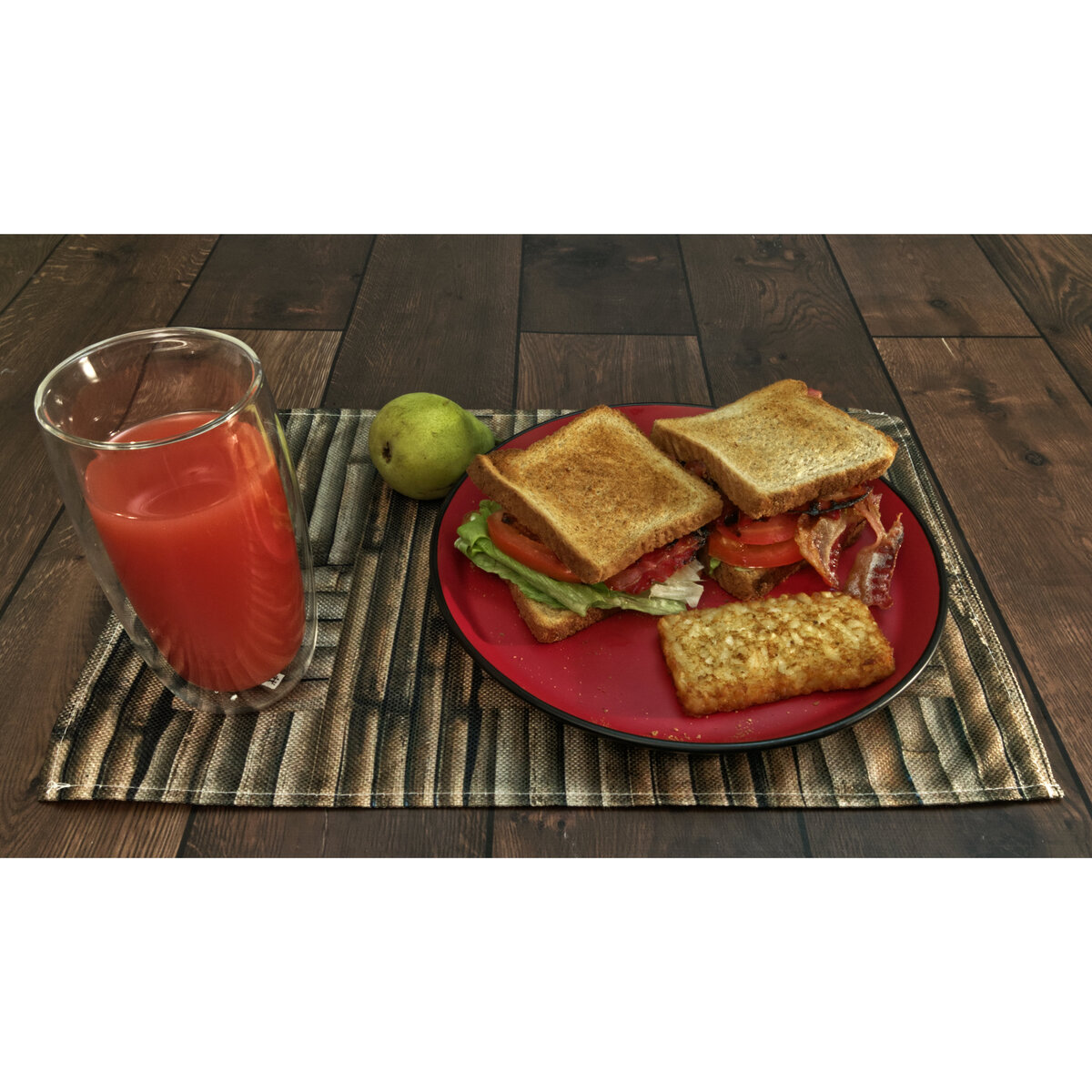 Bacon, Lettuce and Tomato Sandwiches with a Hash Brown Patty, a Pear and Grapefruit Juice