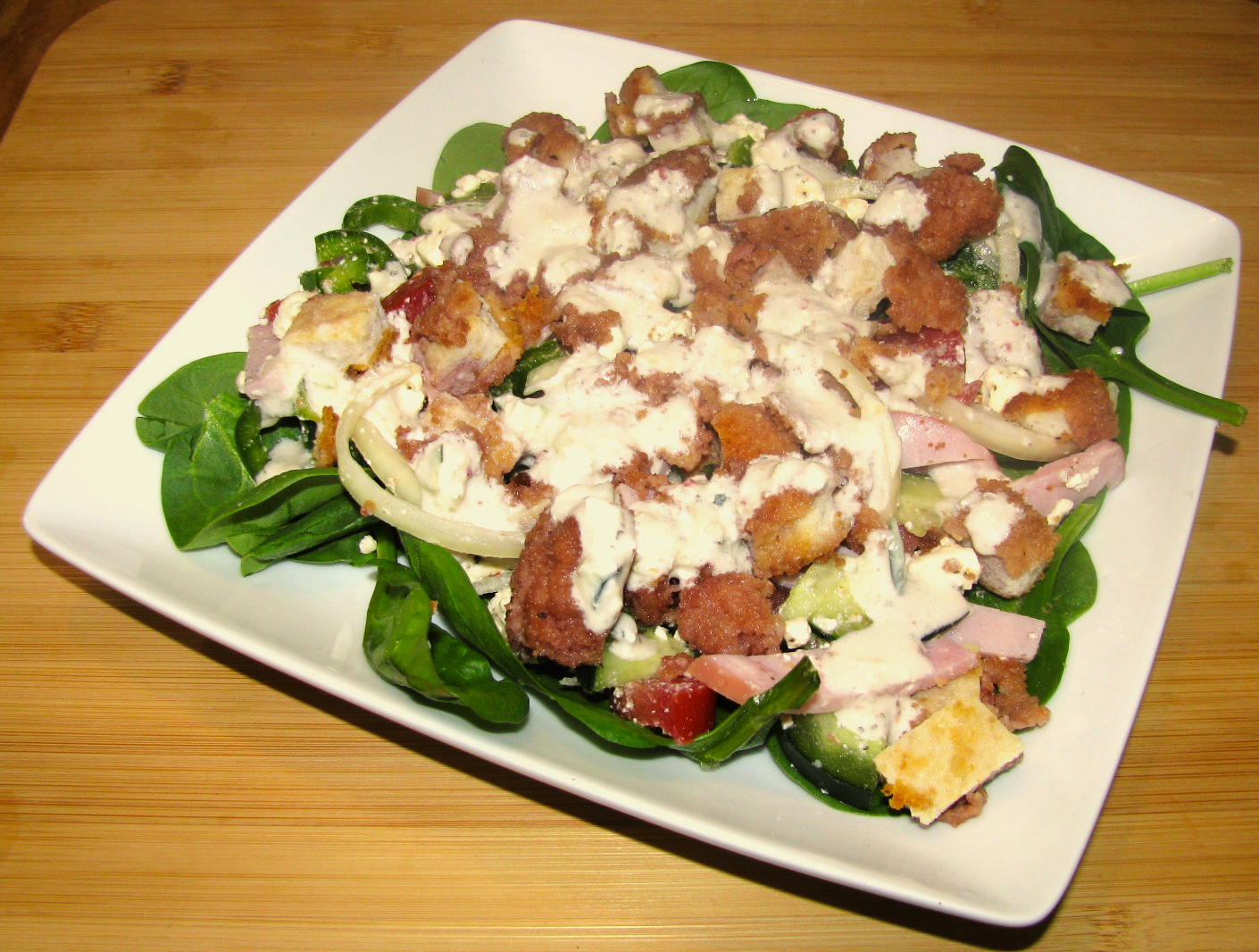 Breaded Chicken Spinach Salad with Creamy Feta Wine Dressing