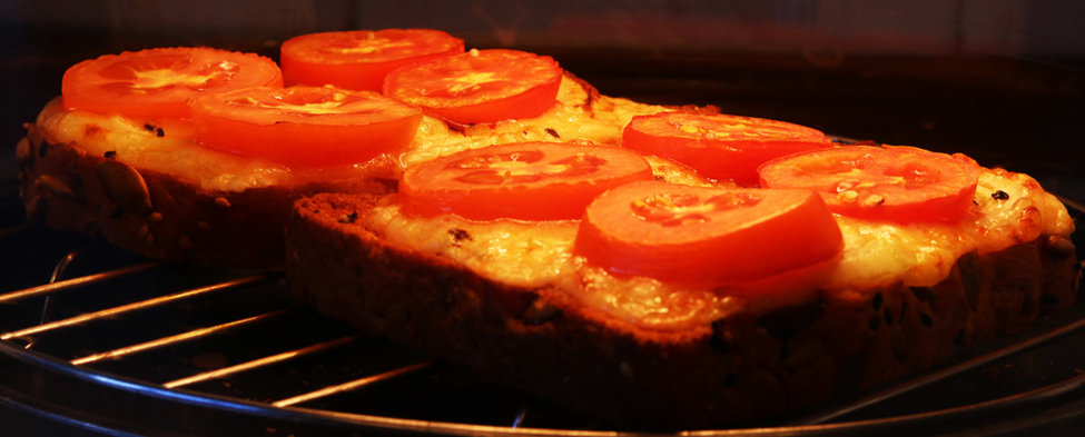 Cheese onion and tomato on toast.