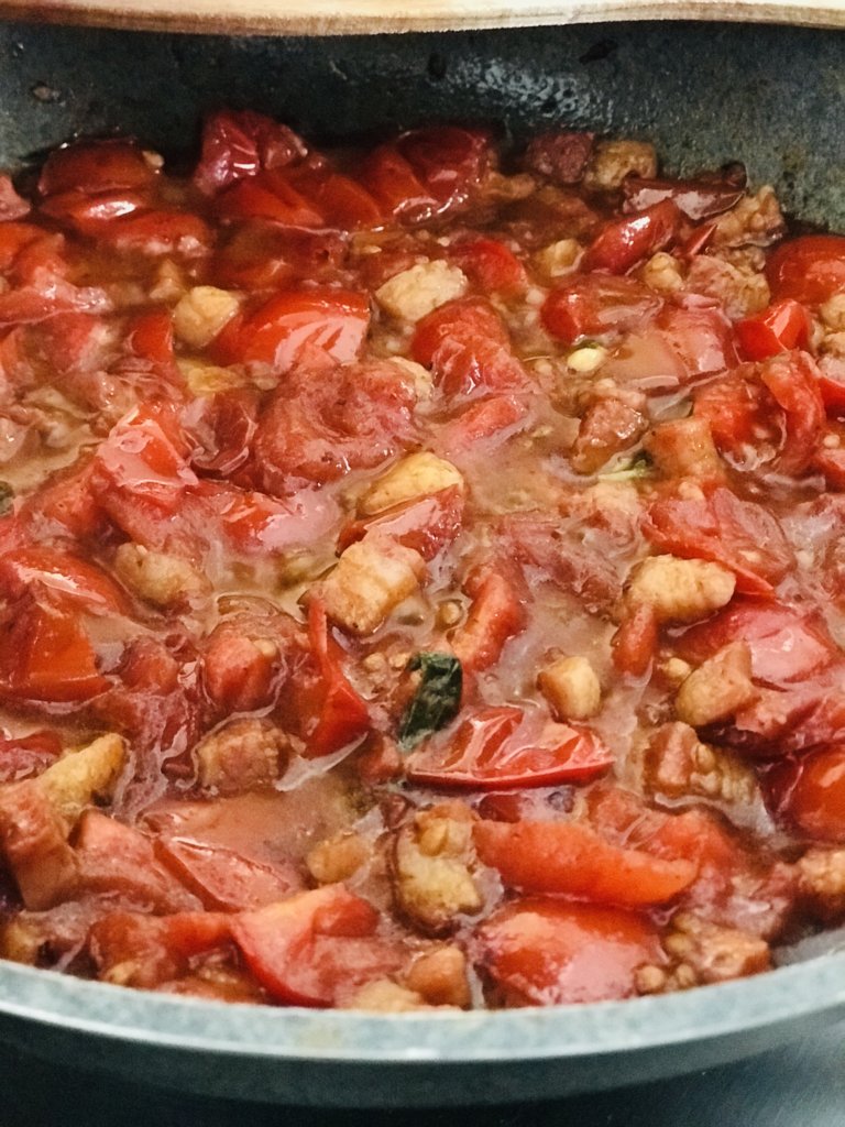 Cherry tomatoes, black garlic and guanciale.jpeg