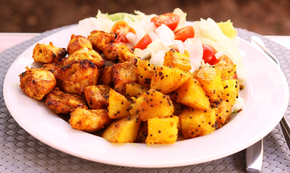 Chicken tikka with Bombay potatoes.