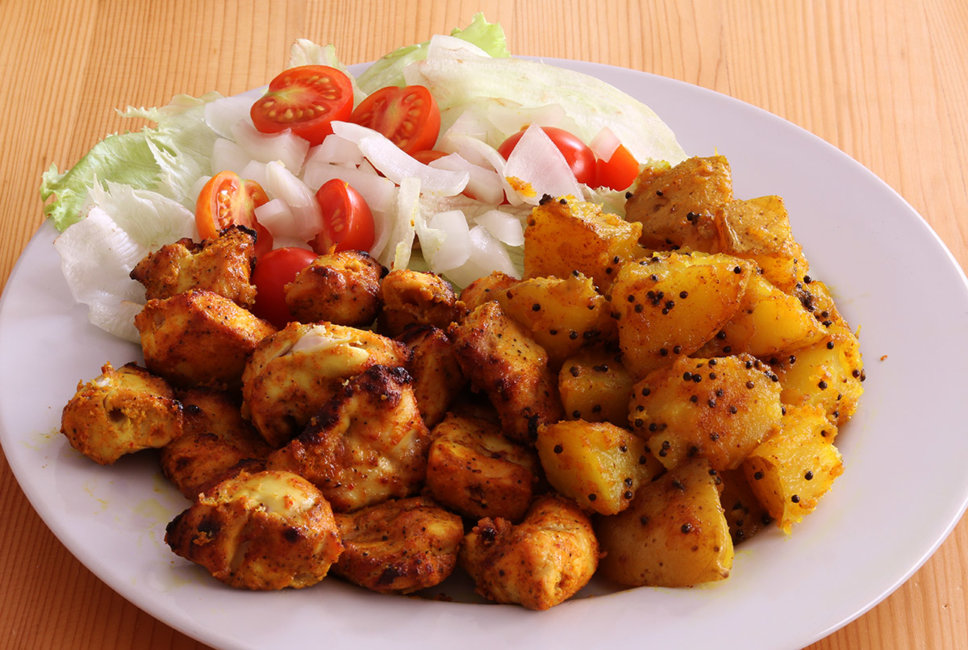 Chicken tikka with Bombay potatoes.
