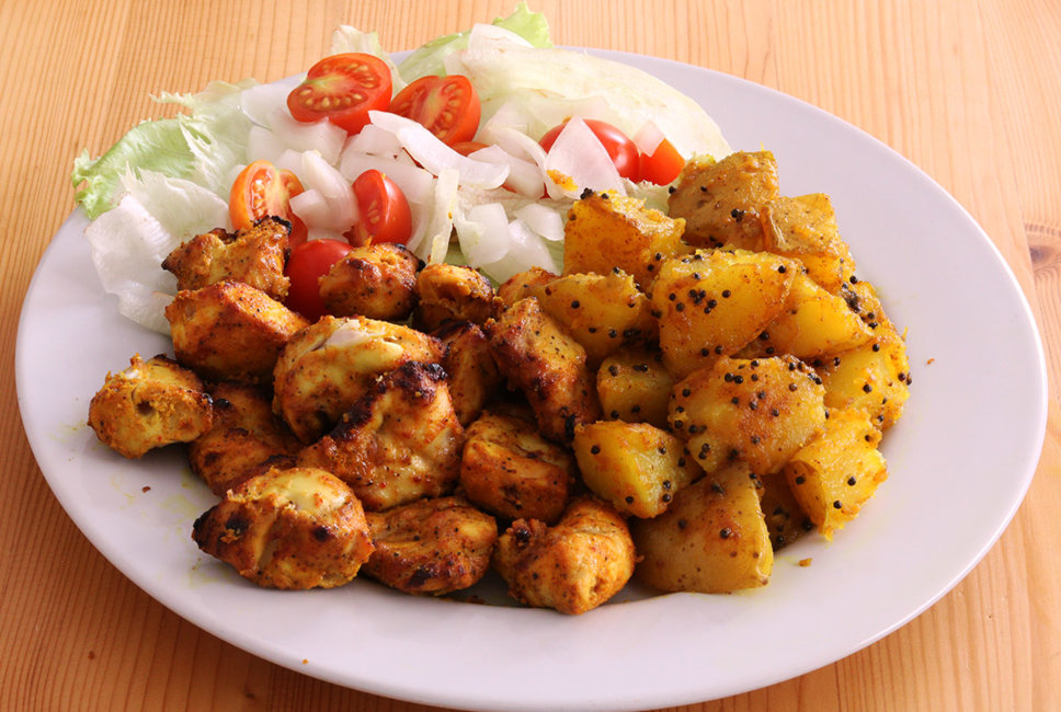 Chicken tikka with Bombay potatoes.