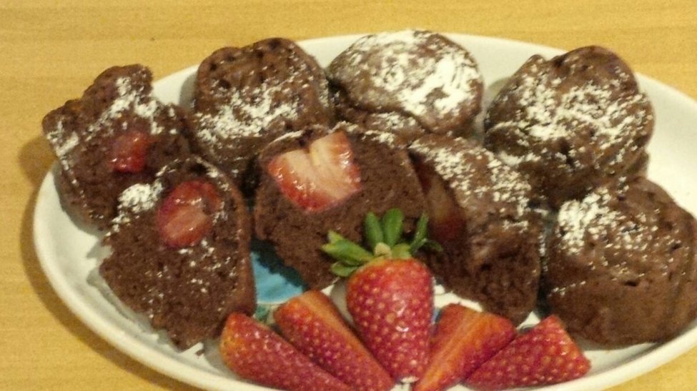 Chocolate muffin stuffed with strawberries