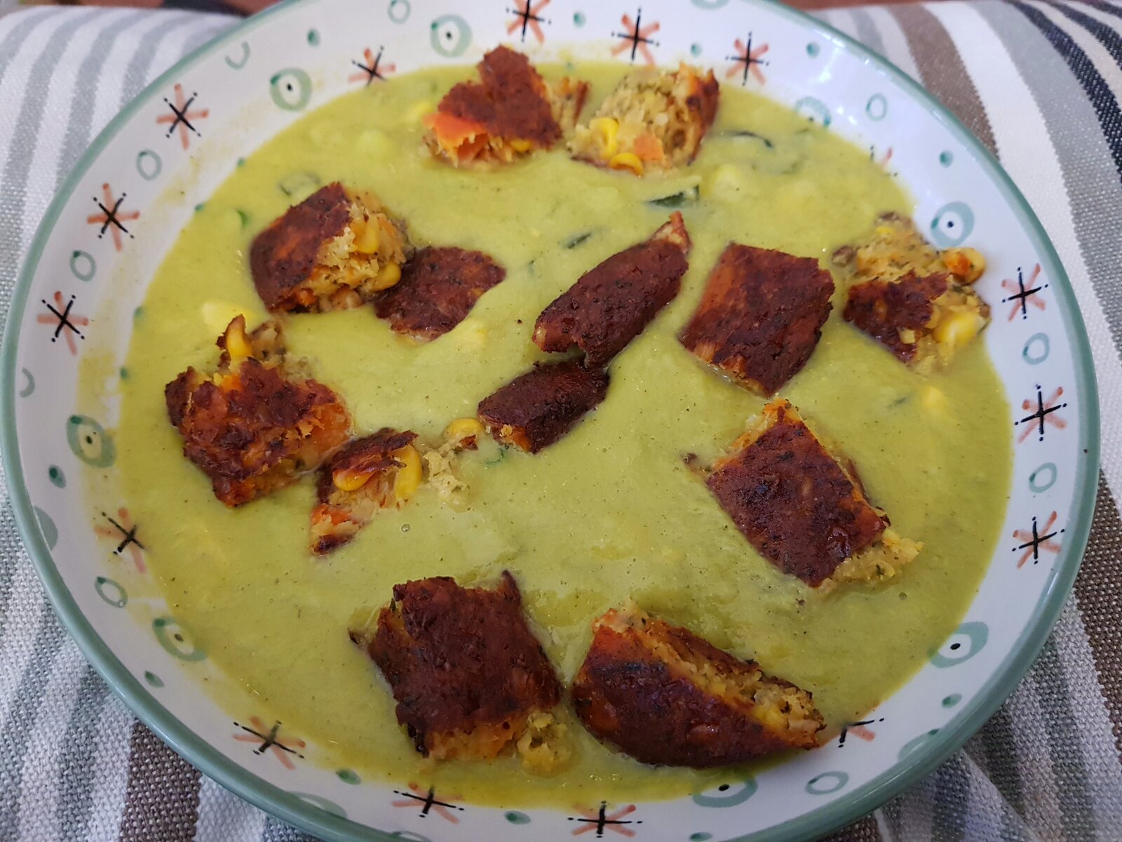 Cold Courgette & Sweetcorn Soup with a veggie burger