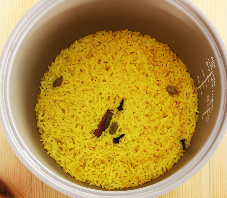 Cooking yellow rice.