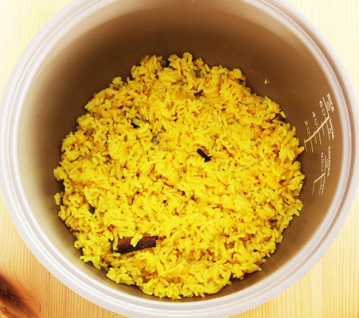 Cooking yellow rice.