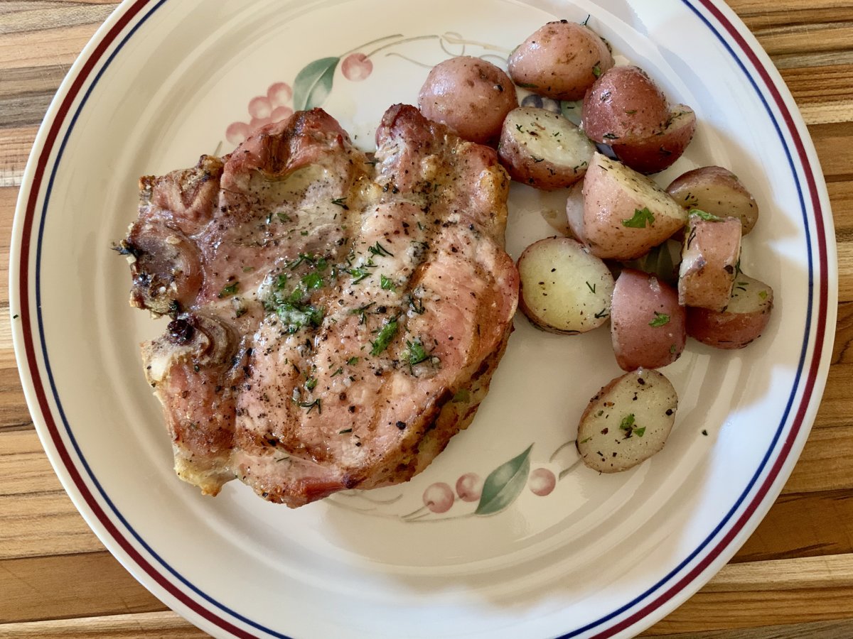 Corn-Stuffed Pork Chops And Herbed Potatoes