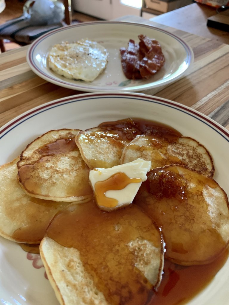 Cornmeal Pancakes, Sorghum, Fried Egg, And Bacon