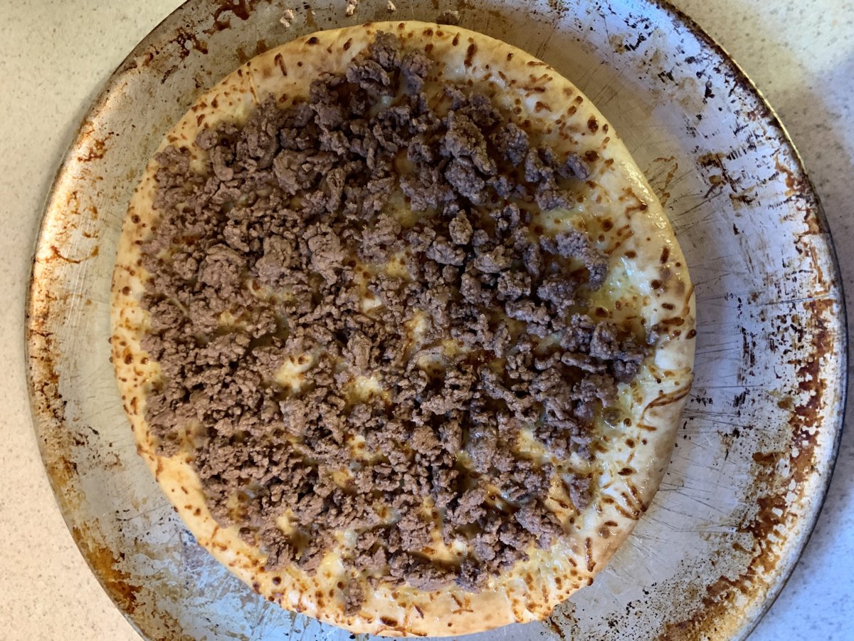 Crust topped with ground beef
