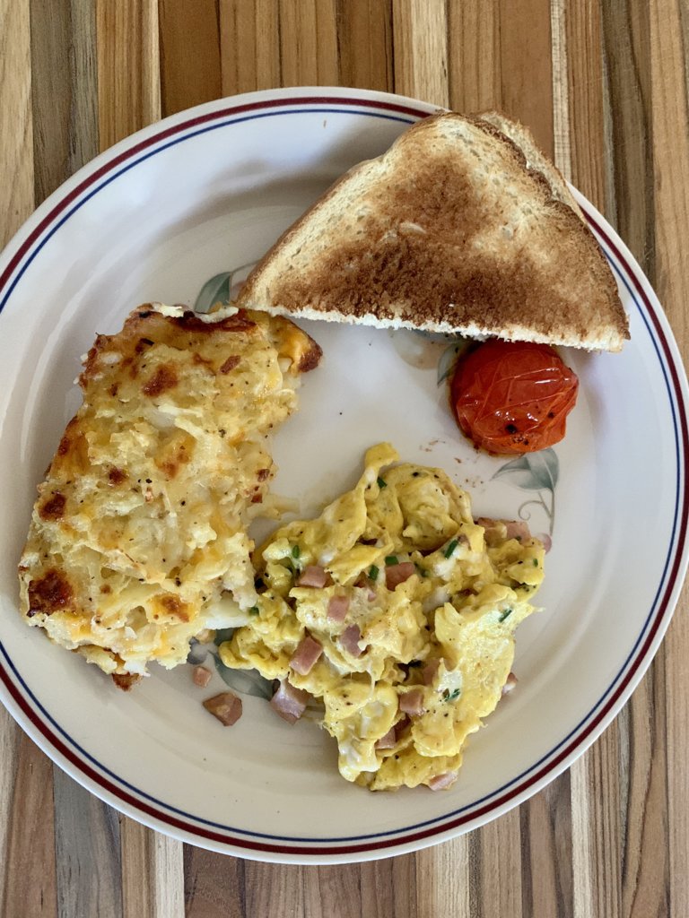 Eggs, Potatoes, Tomato, And Toast