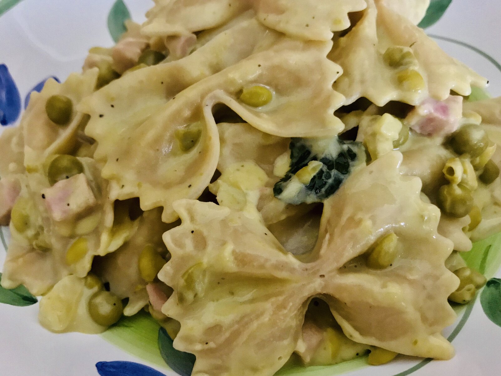 Farfalle with peas, diced prosciutto and ricotta.jpeg