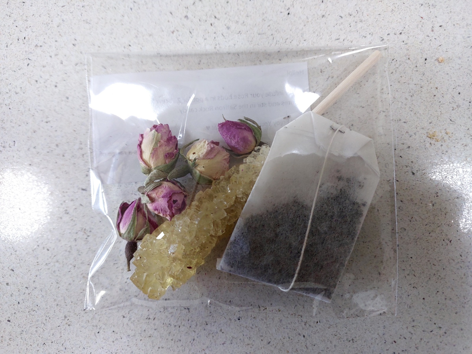 Freebie, saffron, cardamom and black tea with rise buds and saffron sugar crystals
