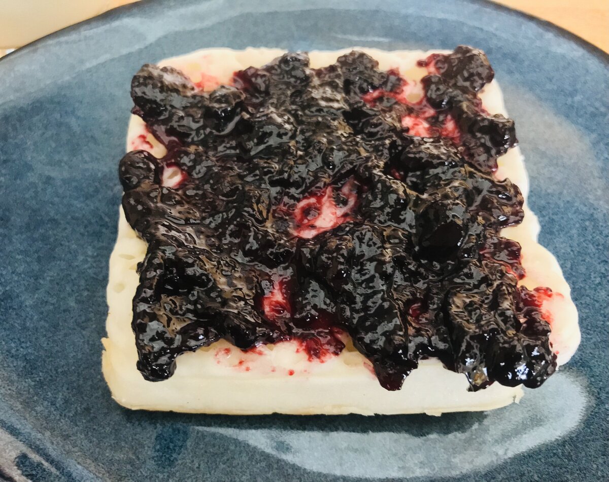 Gluten-Free Crumpet with Cherry Jam.jpeg