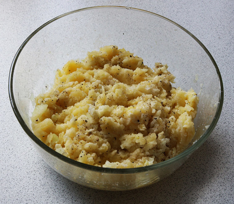 Grated potato,onion and pureed garlic with flour and seasoning