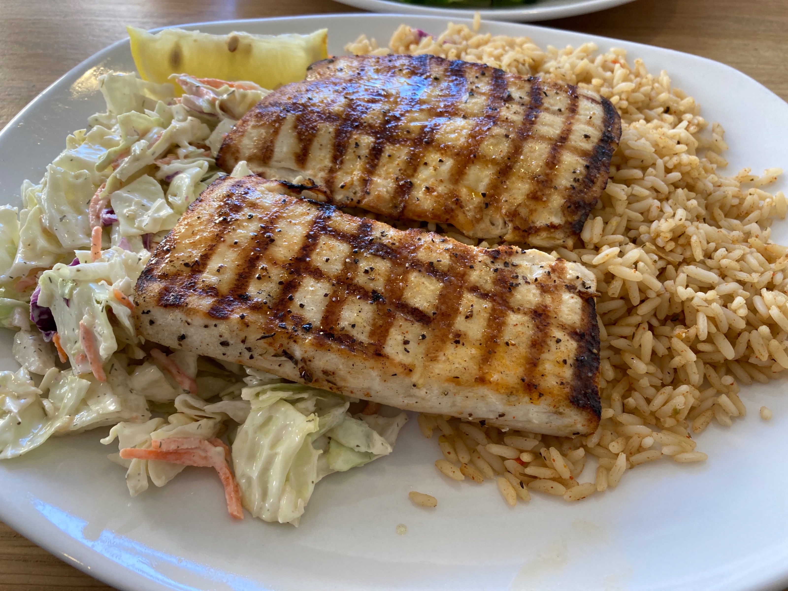 Grilled mahi mahi with cajun rice