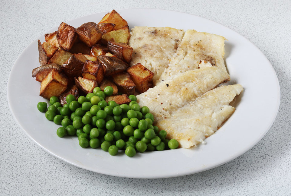 Halibut with roast potatoes and peas.