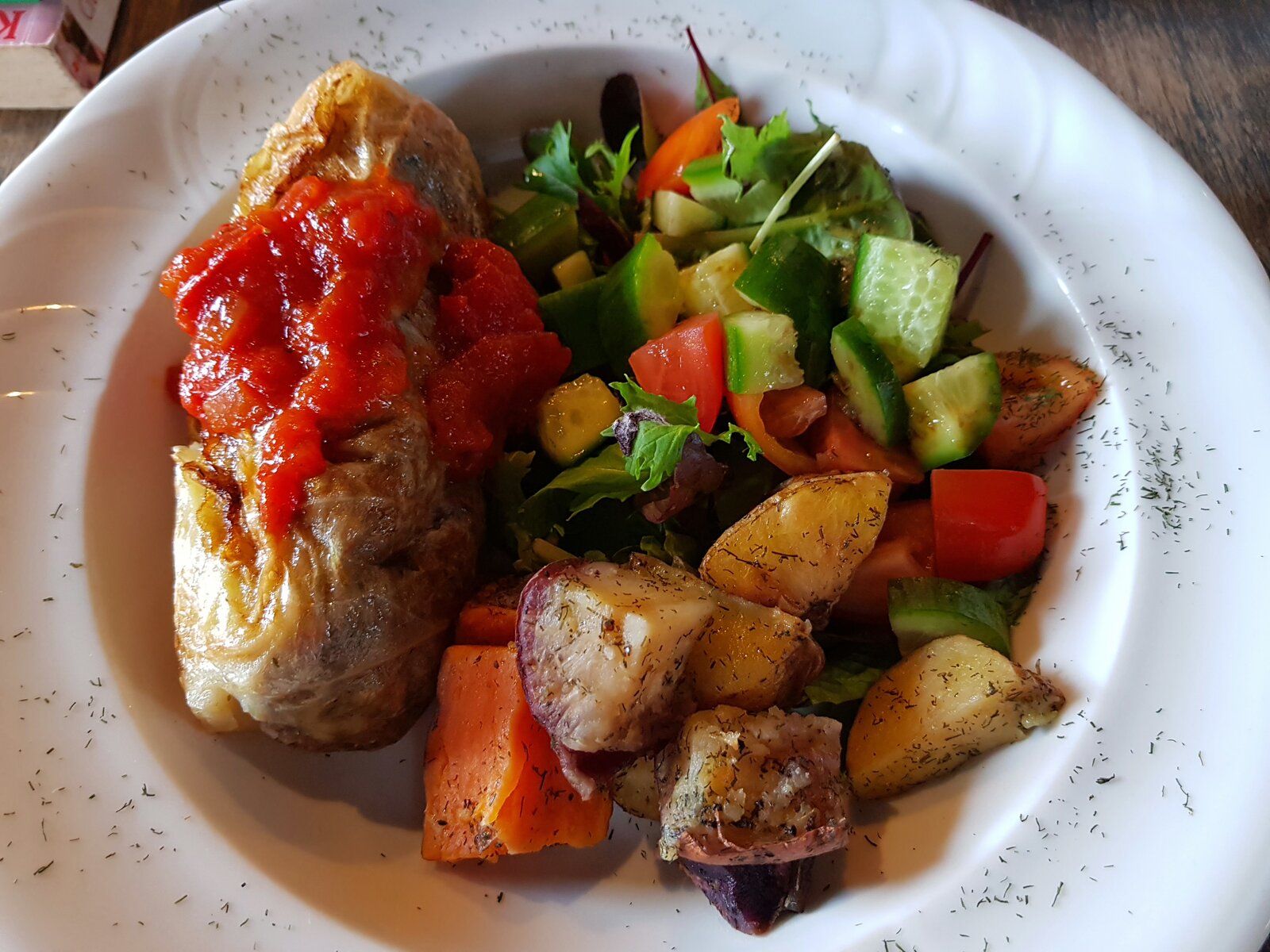 Khazakstan Cabbage Roll with roast potatoes, sweet potatoes & salad