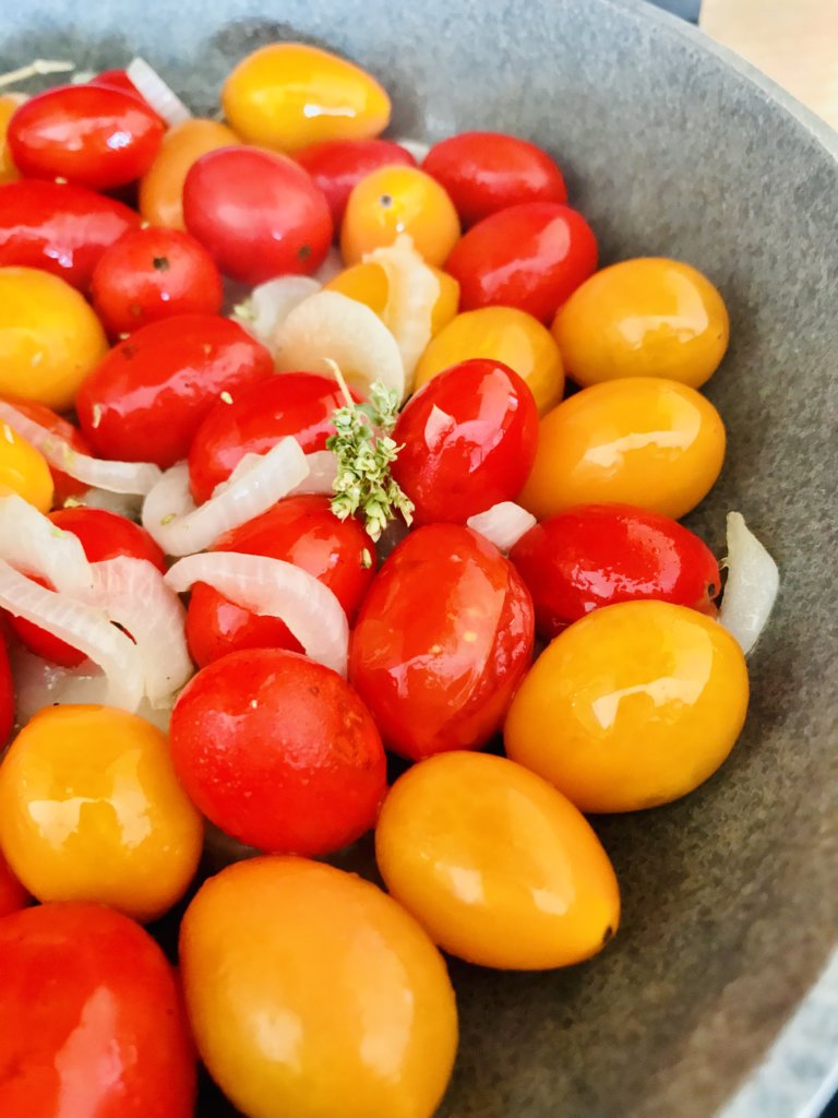 Making cherry tomatoes sauce.jpeg