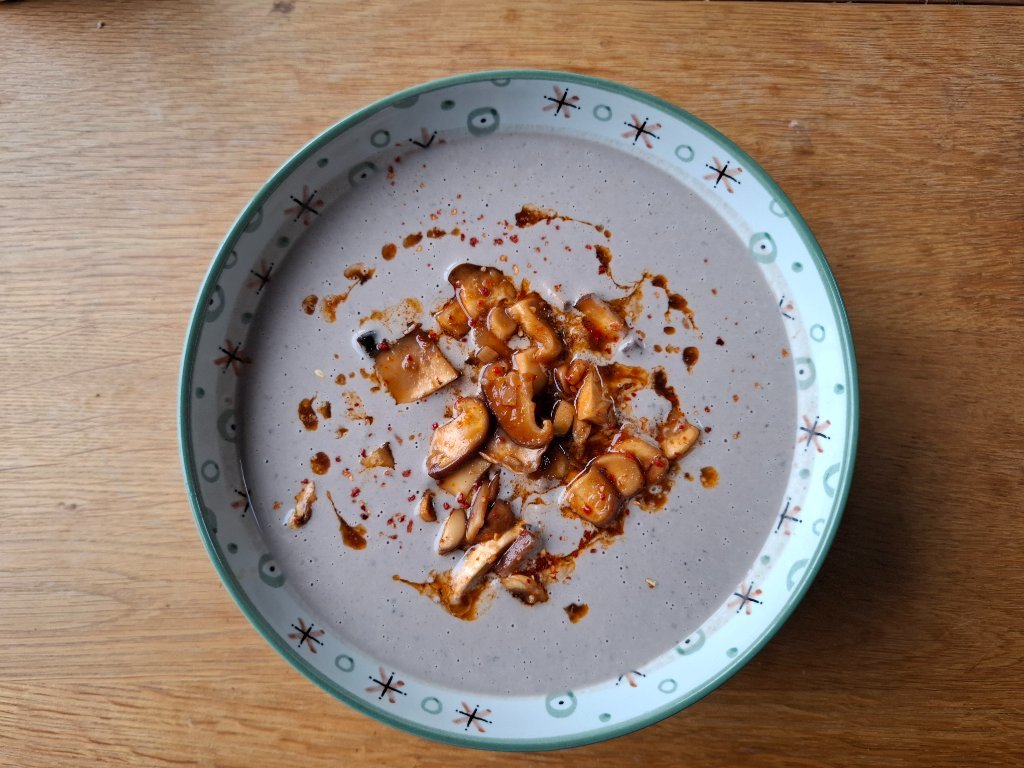 Marinated Mushrooms served in a raw mushroom soup base