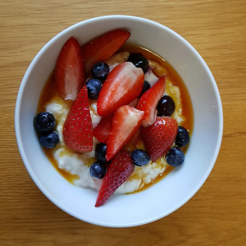 Mixed fresh fruit with soya yoghurt soaked oats