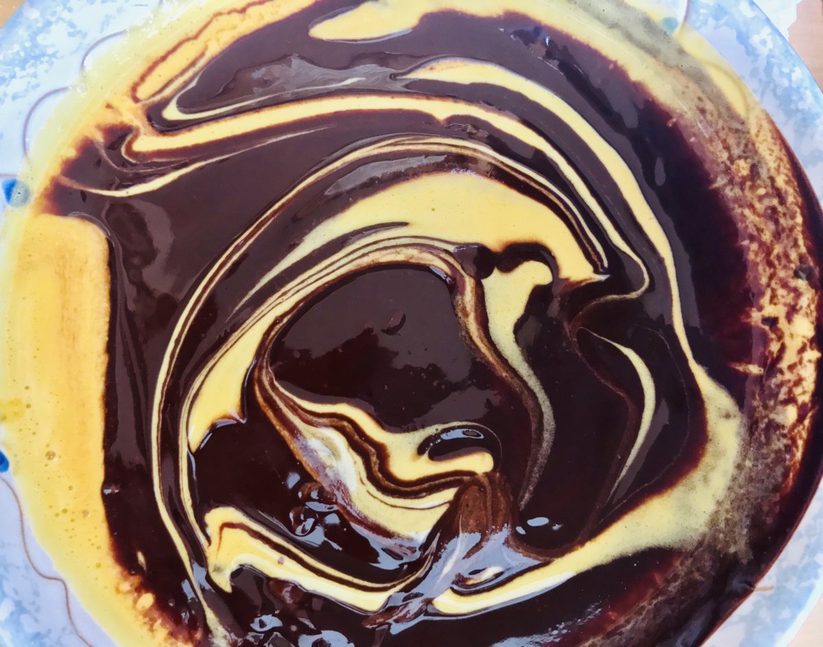 Mixing egg yolks and dark chocolate.jpeg