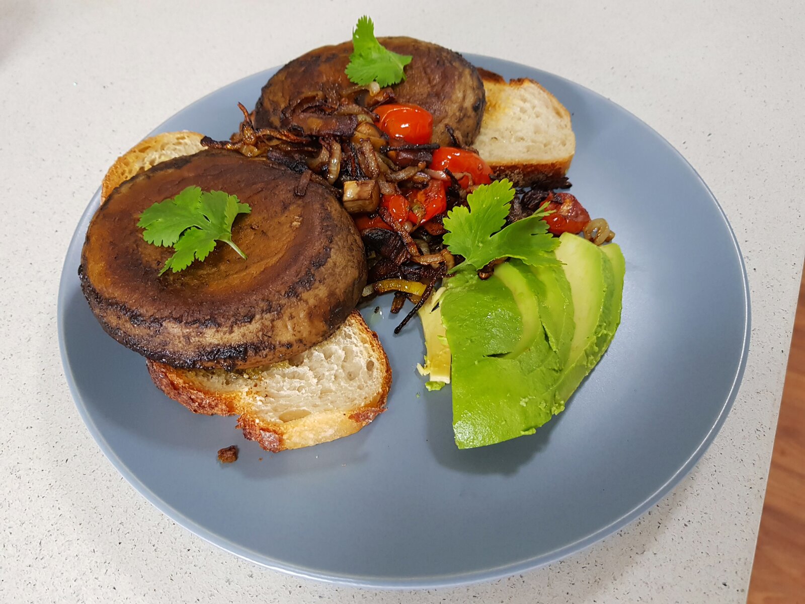 Mushroom steaks on toasted sourdough with avocado