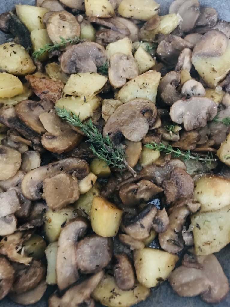 Mushrooms and potatoes with aromatic herbs.jpeg