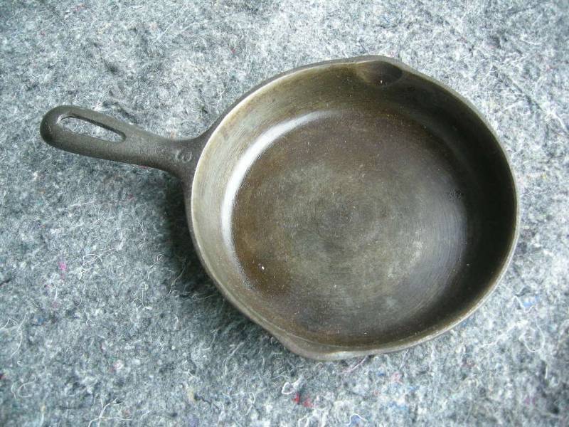 Old cast iron fry pan