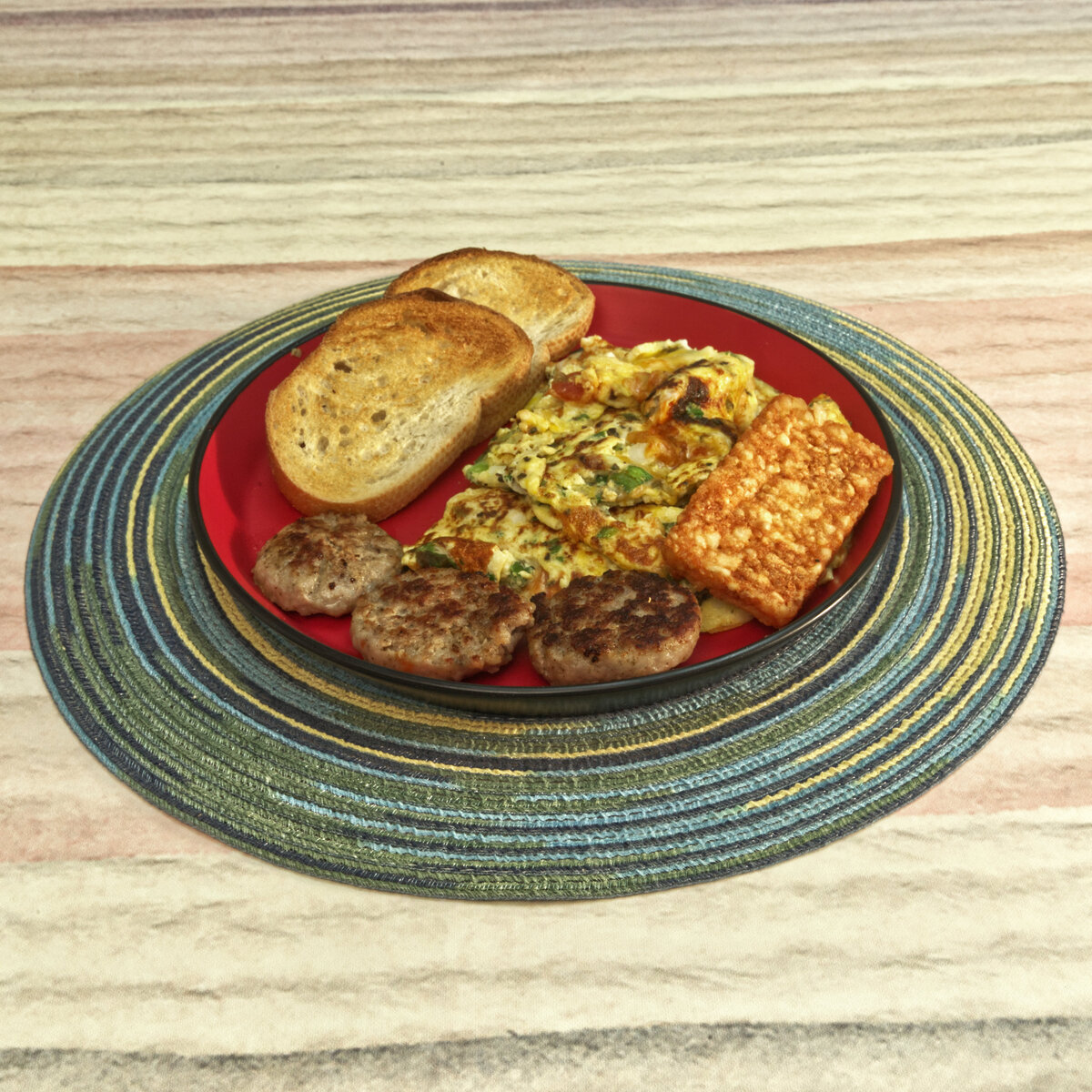 Omelette with Sausage, a Hash Brown Patty and Toast