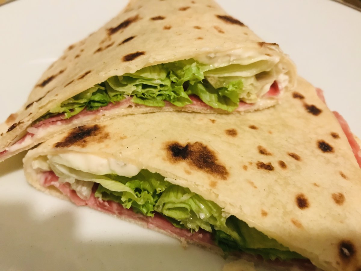 Piadina stuffed with Gorgonzola, salame and salad.jpeg