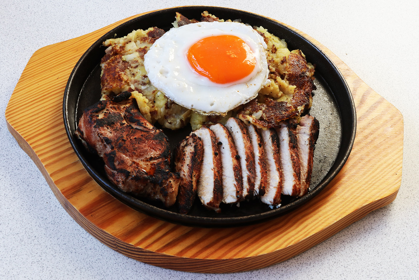 Pork loin with fried mash and egg s.jpg