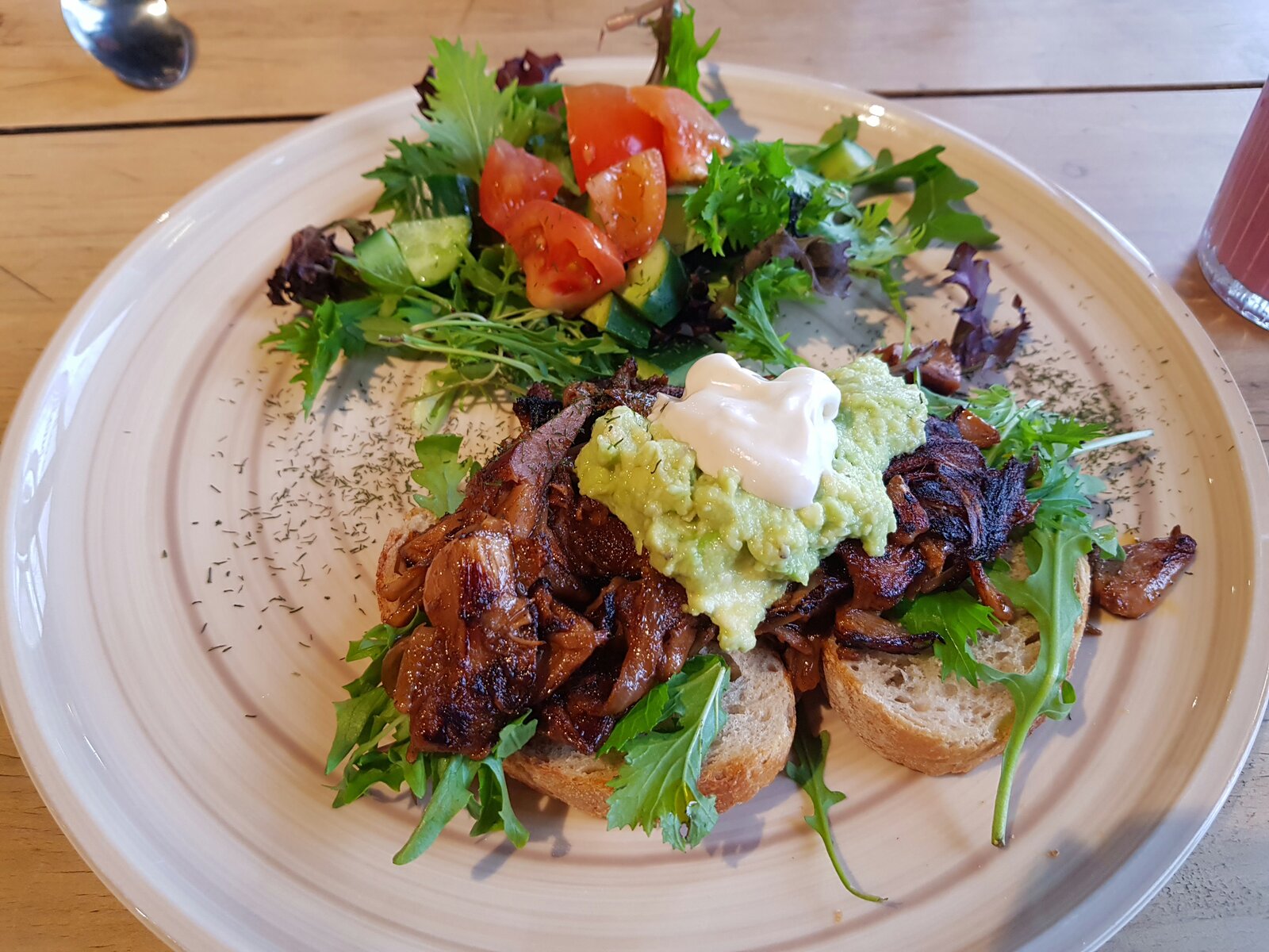 Pulled Jackfruit Burger on sourdough with salad