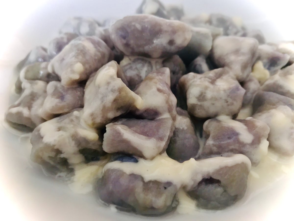 Purple potato gnocchi with Taleggio cheese sauce.jpeg