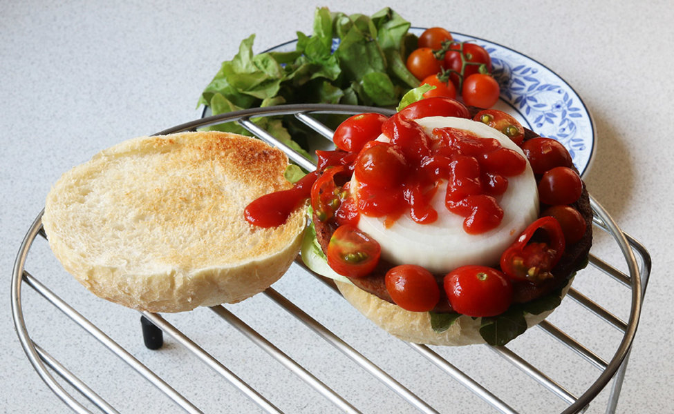 Raw onion, cherry tomatoes and ketchup.