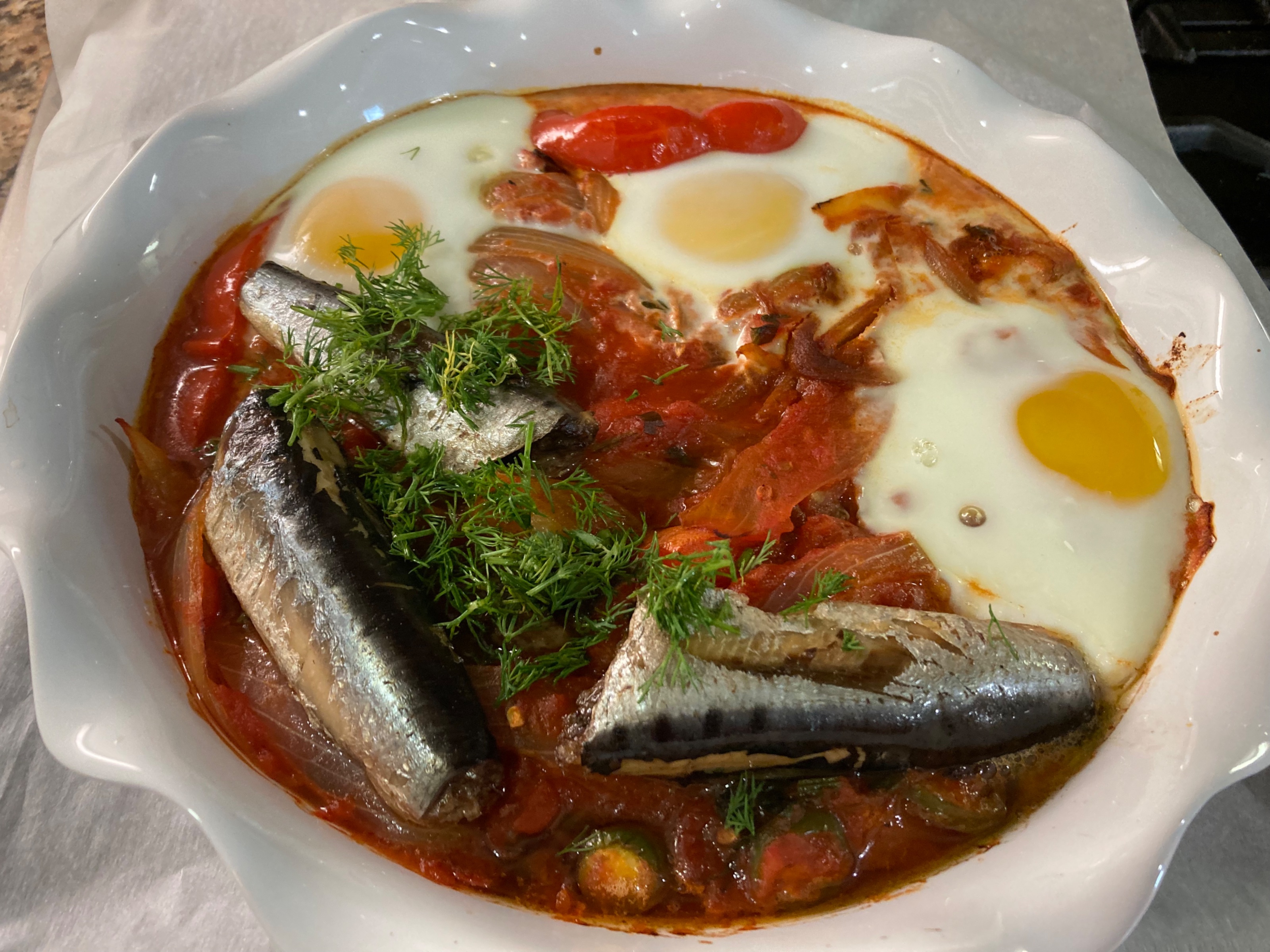 Sardine and egg shakshouka